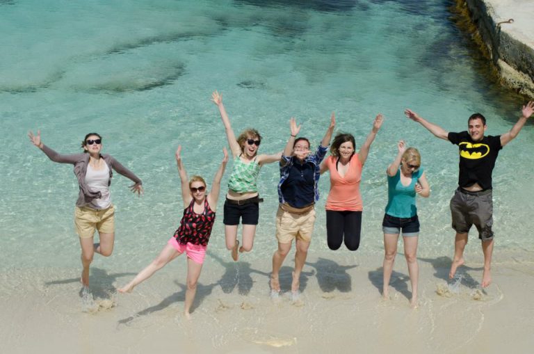 Students having fun on the beach in Malta